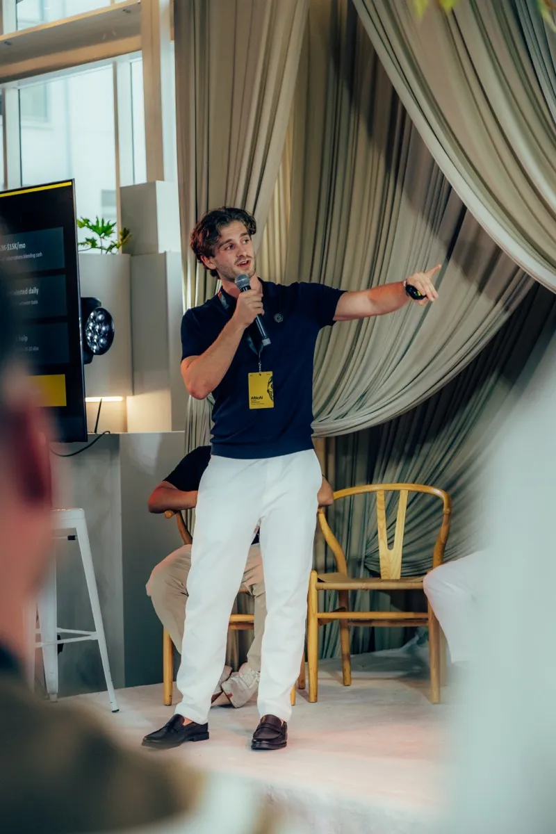 Adam on stage at the AfricAI summit in Cape Town